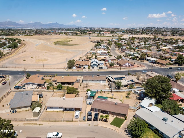 678 Lomaland Dr, El Paso, TX 79907 - aerial view of property and surrounding area with a mountainous background and nearby suburban area