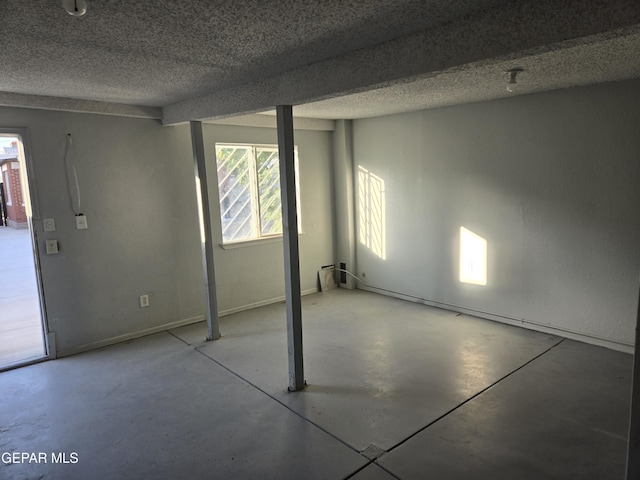 basement with a textured ceiling