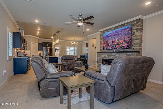 living room with crown molding, light tile patterned floors, and a stone fireplace