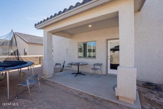 view of patio / terrace with a trampoline