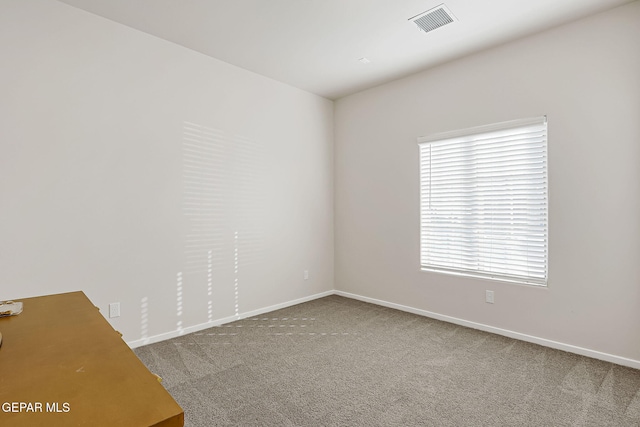 view of carpeted spare room