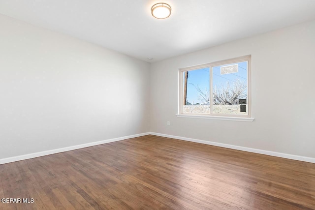 unfurnished room featuring hardwood / wood-style floors