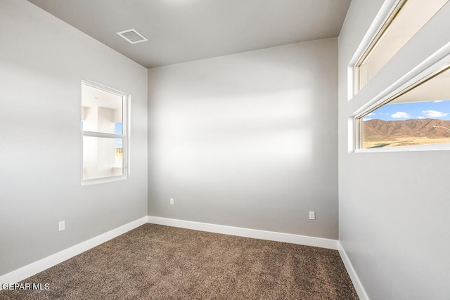 empty room featuring carpet