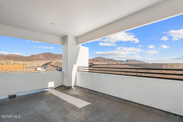 balcony featuring a mountain view