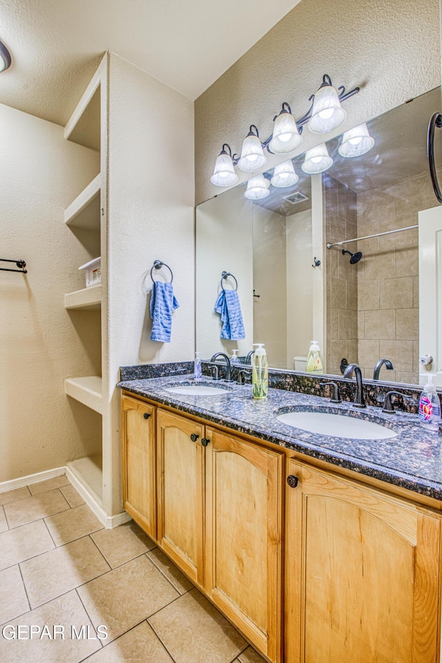 bathroom featuring vanity and tile patterned floors