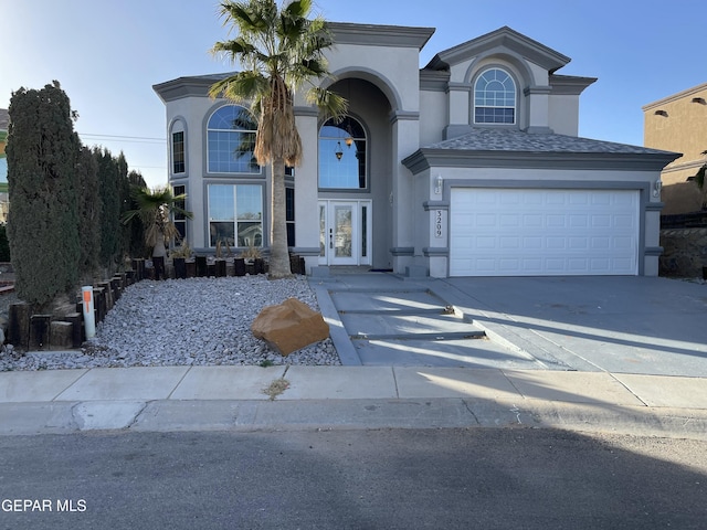 view of front of home with a garage