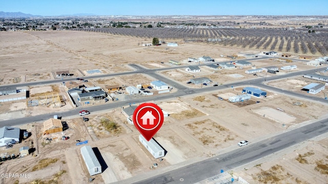 birds eye view of property featuring a rural view