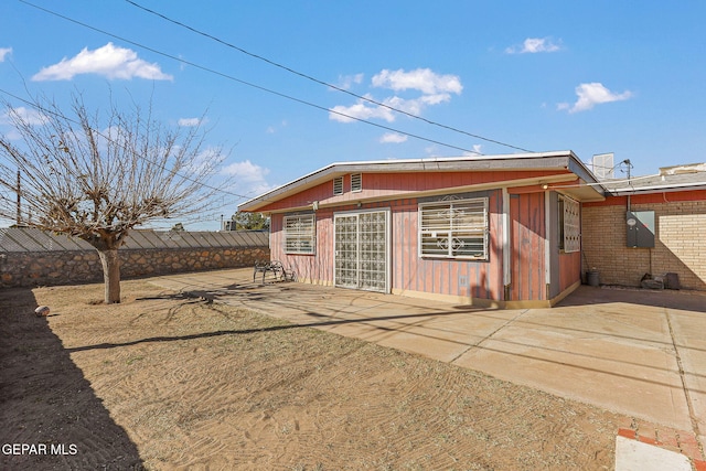 back of house with a patio area