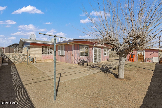 back of house featuring a patio