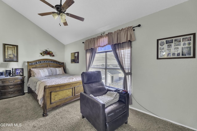 carpeted bedroom with ceiling fan and vaulted ceiling