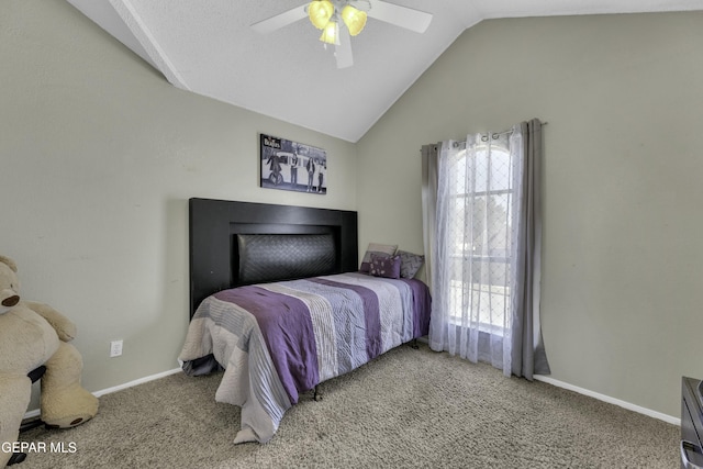 carpeted bedroom featuring ceiling fan and lofted ceiling