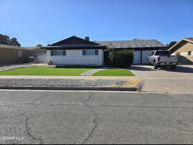 ranch-style house with a garage