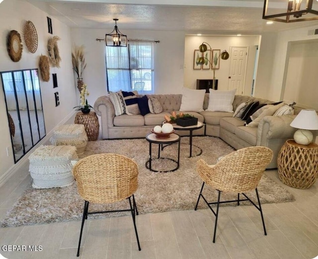 living room featuring a chandelier