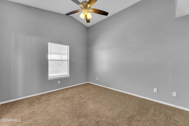 carpeted empty room with ceiling fan and lofted ceiling