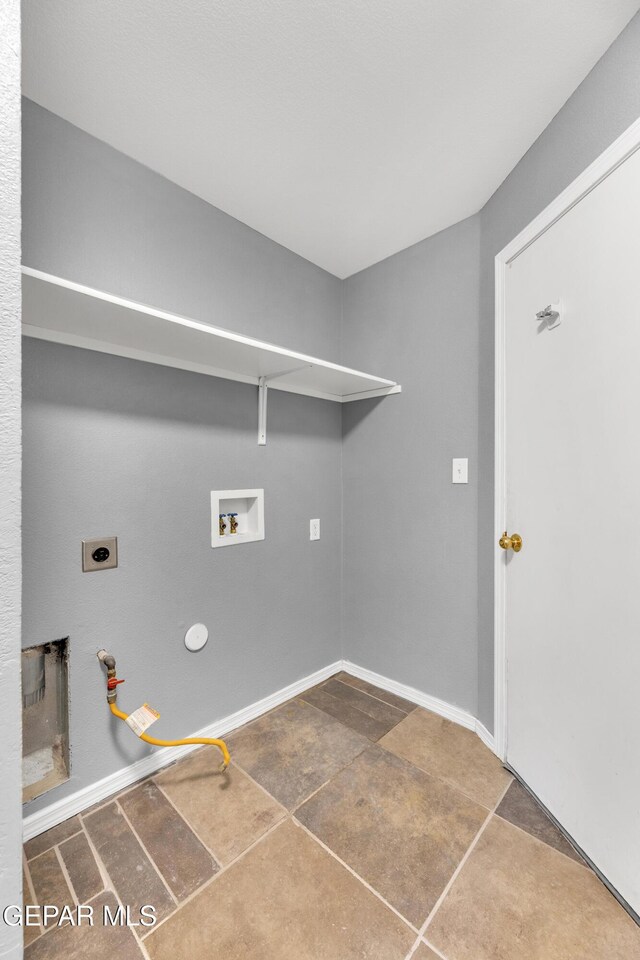 laundry room featuring hookup for an electric dryer, hookup for a washing machine, and gas dryer hookup