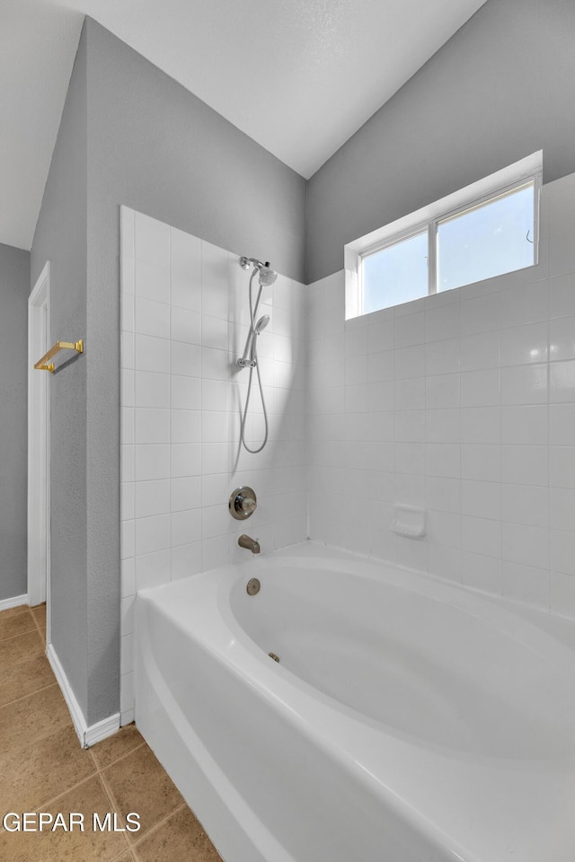 bathroom with shower / bathtub combination and tile patterned floors