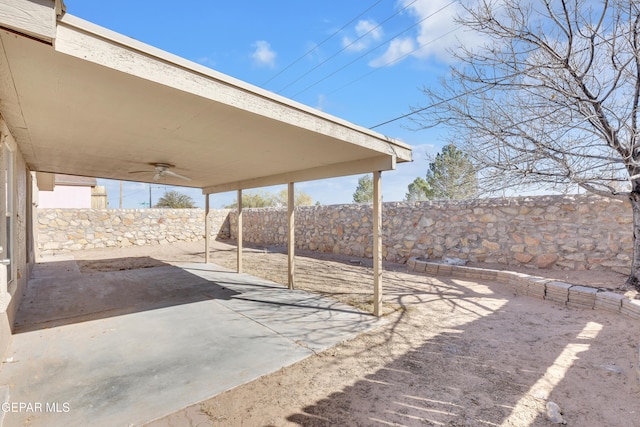 view of patio / terrace featuring ceiling fan