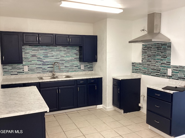 kitchen featuring decorative backsplash, sink, light tile patterned floors, and island range hood