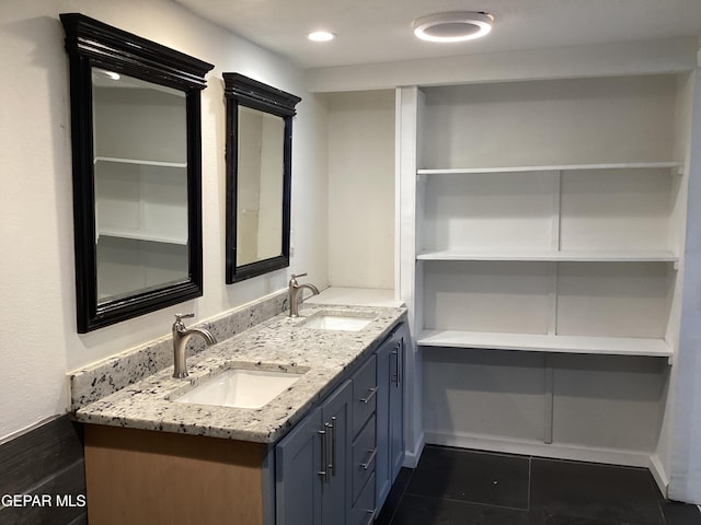 bathroom featuring vanity and tile patterned floors