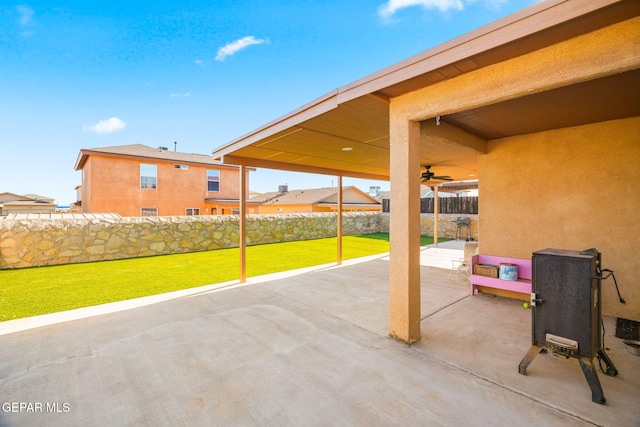 view of patio / terrace featuring ceiling fan