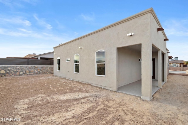 rear view of property with a patio area