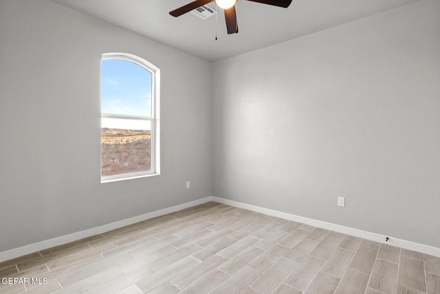 spare room featuring ceiling fan