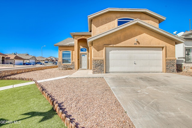 view of front of property with a garage