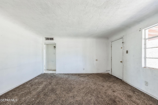 spare room with carpet floors