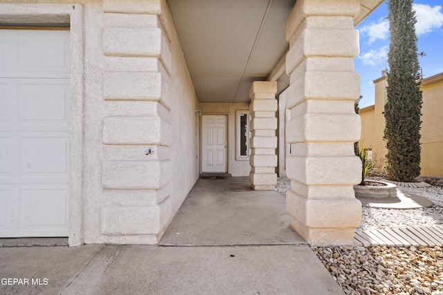 entrance to property with a garage