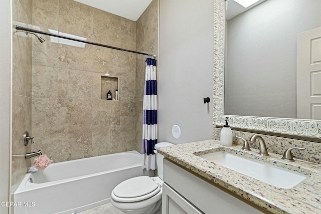 full bathroom featuring toilet, vanity, and shower / bath combo with shower curtain