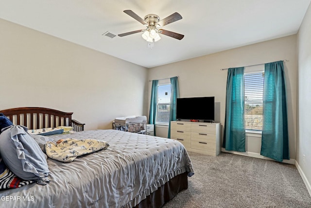 carpeted bedroom featuring ceiling fan