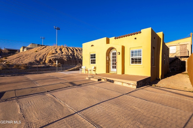 view of front of home featuring a patio area