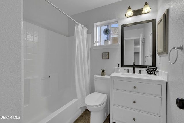 full bathroom featuring shower / bathtub combination with curtain, vanity, and toilet