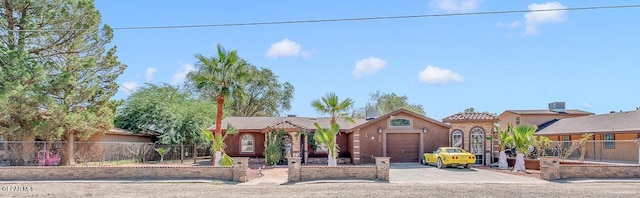 view of front of property featuring a garage