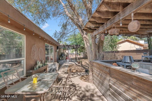 view of patio featuring a pergola