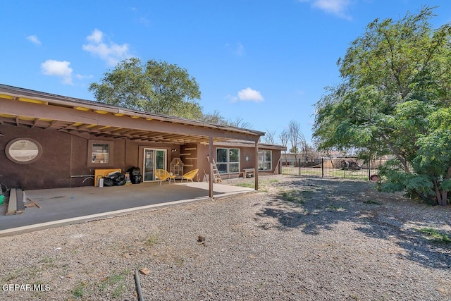 rear view of house featuring a patio area