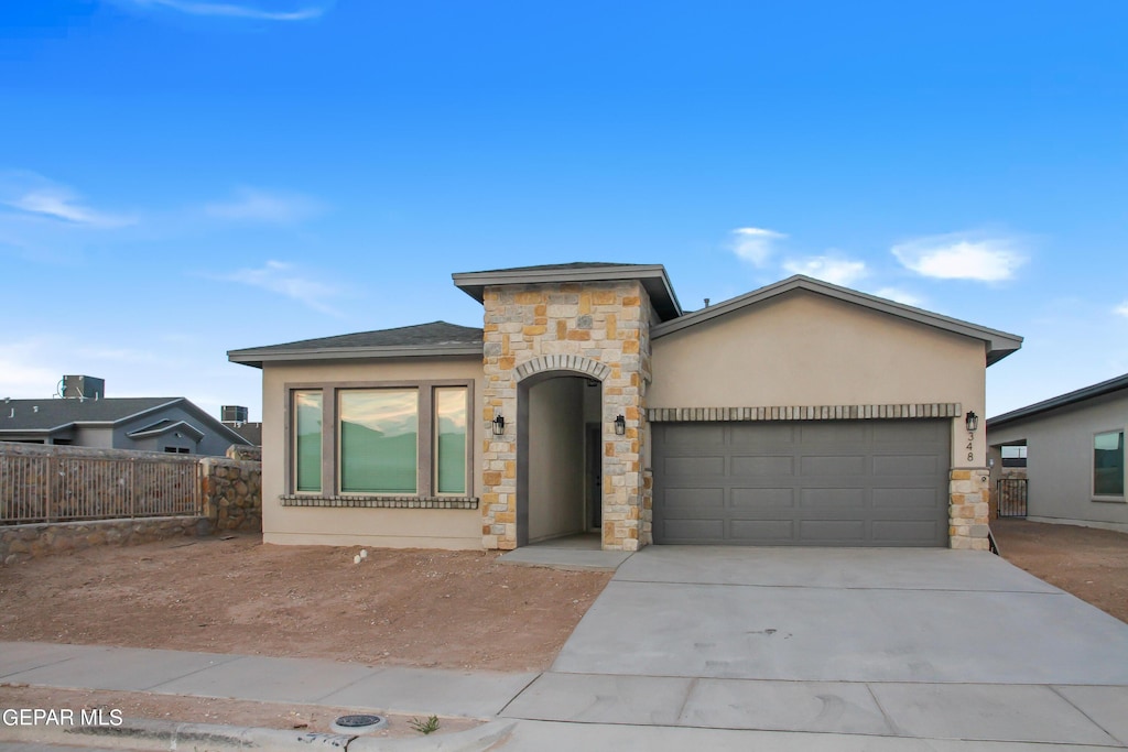 view of front of home with a garage