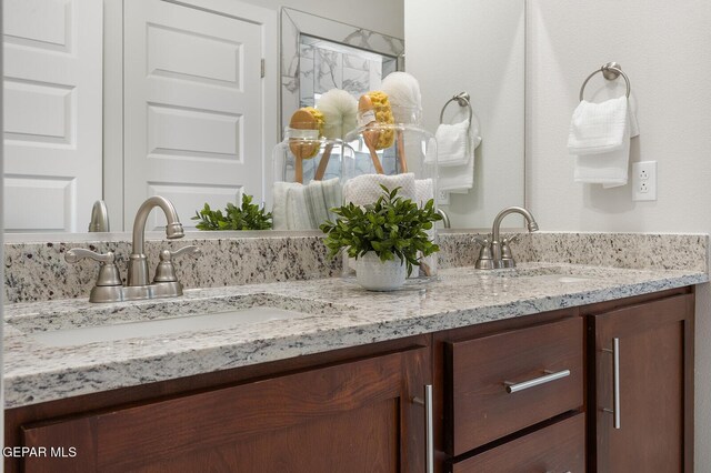1022 Callie Ct, Socorro, TX 79927 - full bath featuring a sink and double vanity