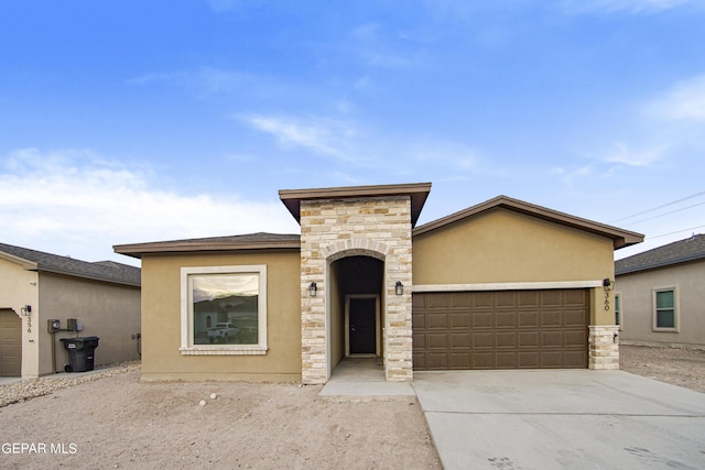 view of front of property with a garage