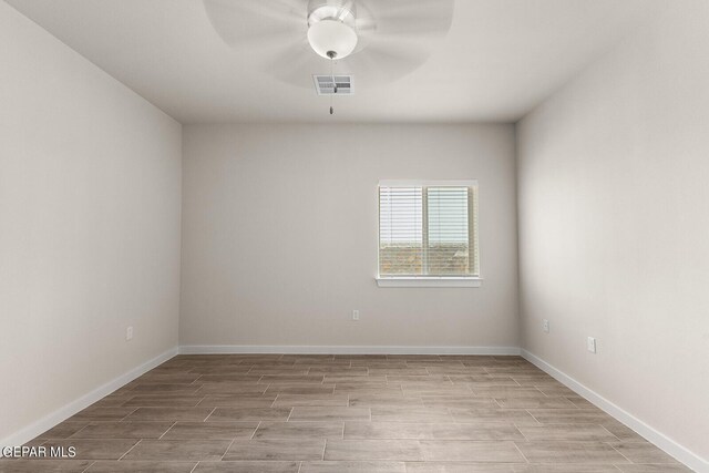 spare room featuring ceiling fan