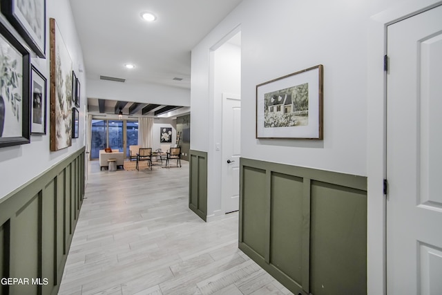 hall with light wood-type flooring