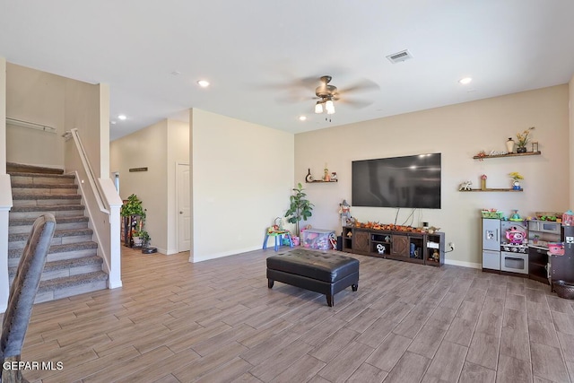 living room featuring ceiling fan