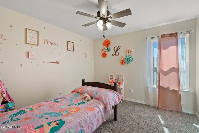 bedroom with ceiling fan and carpet