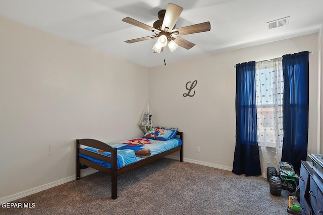 bedroom with ceiling fan and carpet flooring