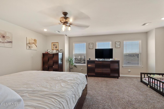 carpeted bedroom featuring ceiling fan