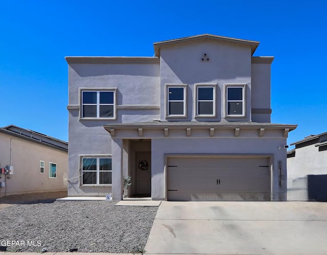 view of front of house with a garage