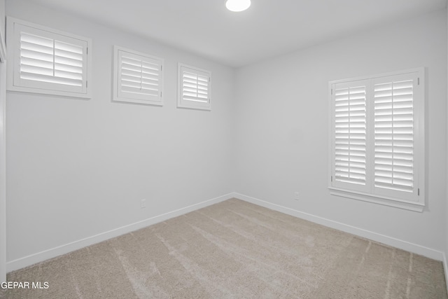 view of carpeted spare room