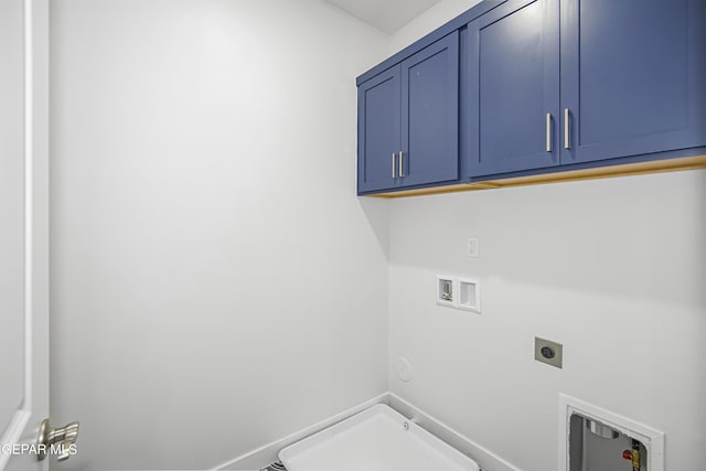 laundry area featuring cabinets, hookup for a gas dryer, hookup for a washing machine, and electric dryer hookup