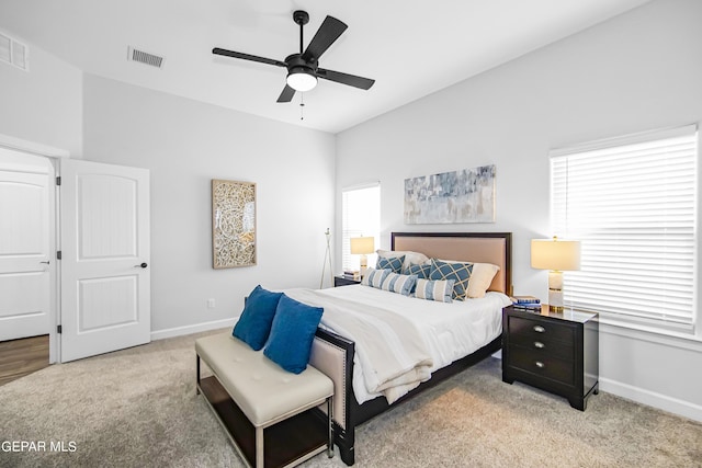 carpeted bedroom with ceiling fan