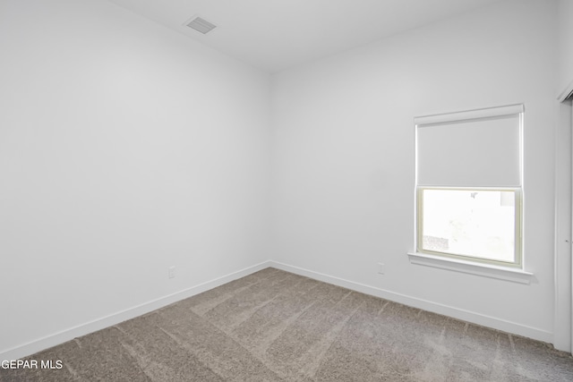 spare room with carpet flooring